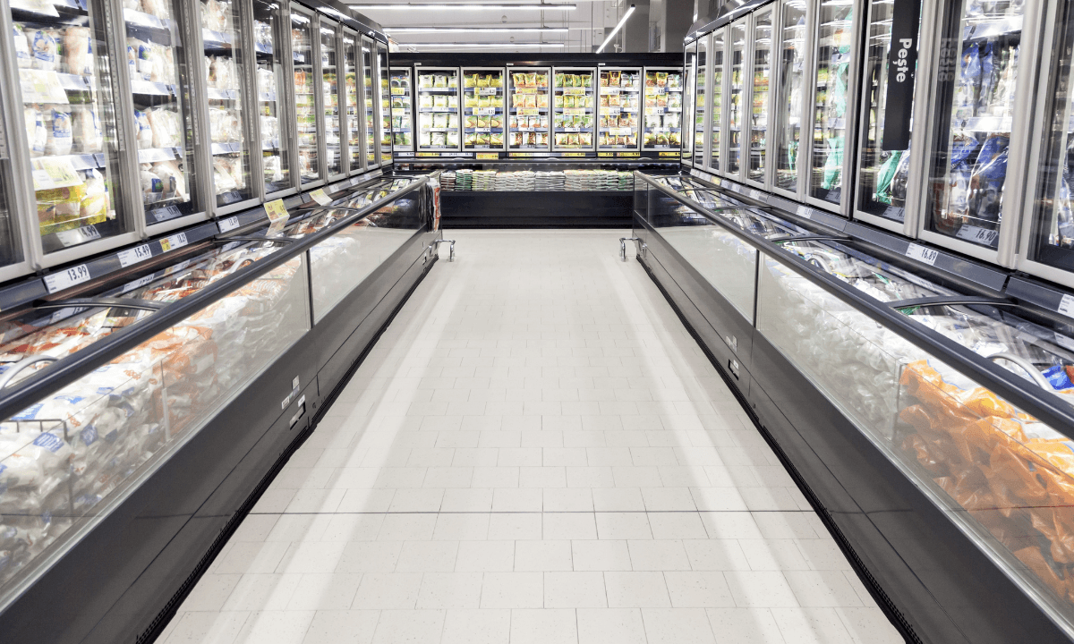 A supermarket frozen food aisle. Australia is considering an R404A ban and GWP limits for commercial refrigeration, which could impact grocery stores in the country.