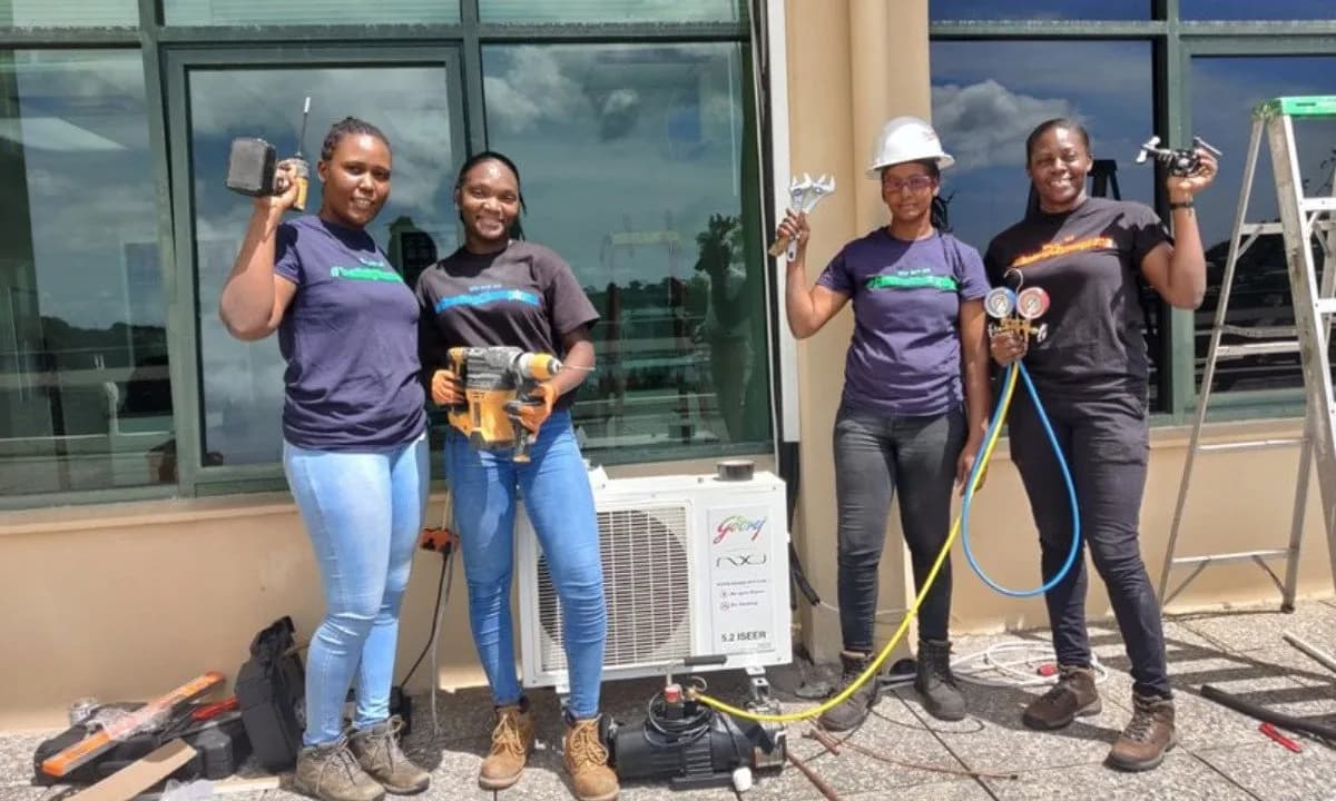 Technicians Marah St. John, Angela St. Bernard, Carlinda Passee and Akelsha Cato installed the R-290 AC in the office of Minister James.