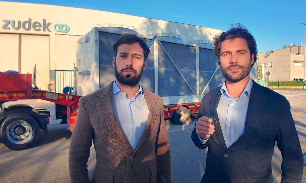 Ivan Zudek (left) and Jakob Terčon, Zudek, discussing the company’s Airmatik chiller for HVAC applications.