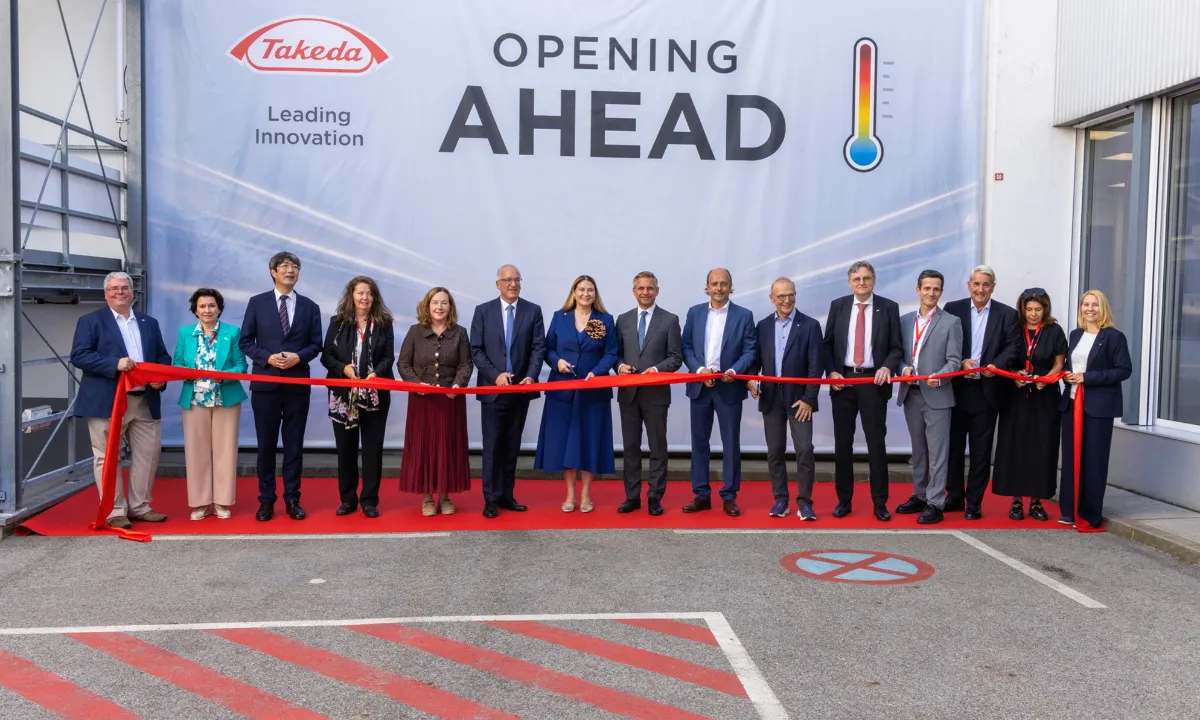 Members of Takeda, AIT and other stakeholders of the AHEAD project cutting the ribbon on Takeda's new butane–water heat pump in Vienna.