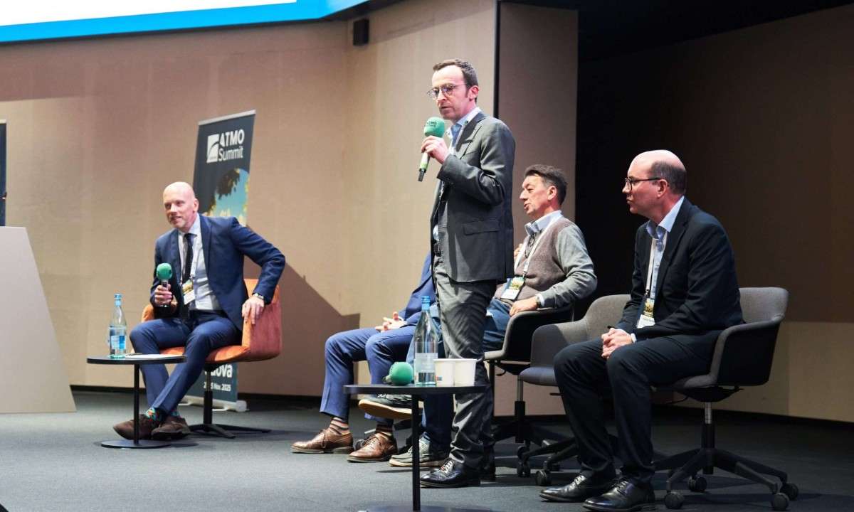 An image of Jean-Baptiste Laurencon Auchan’s Technical Asset Director presenting at ATMO Europe 2025, with Fabian Gantois, Manager of Retailer Sales and End Users at Copeland seated to his left. The two discussed the benefits of Copeland's decentralized CO2 solution over conventional CO2 racks.