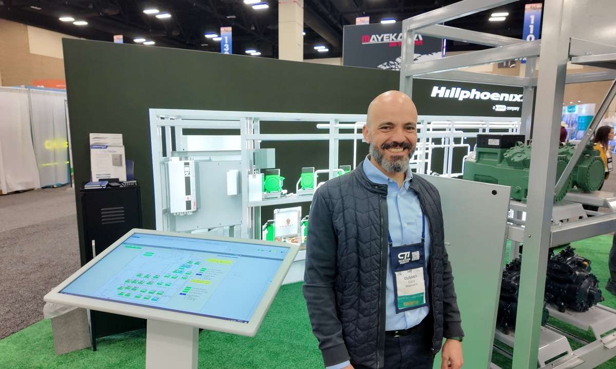 Ousama Sabra in front of the Hillphoenix industrial CO₂ rack platform - AdvansorUltra at IIAR 2026