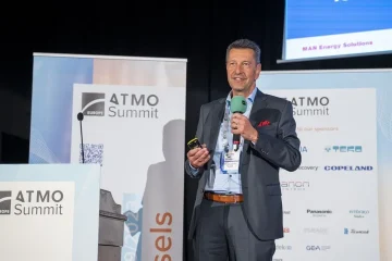 Raymond Decorvet, MAN Energy Solutions, presenting on large-scale heat pump projects at ATMO Europe Summit 2023.