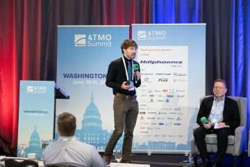Robbie Svidron of Intellihot presenting the company's tankless CO2 heat pump hot water heaters at ATMO America 2024.